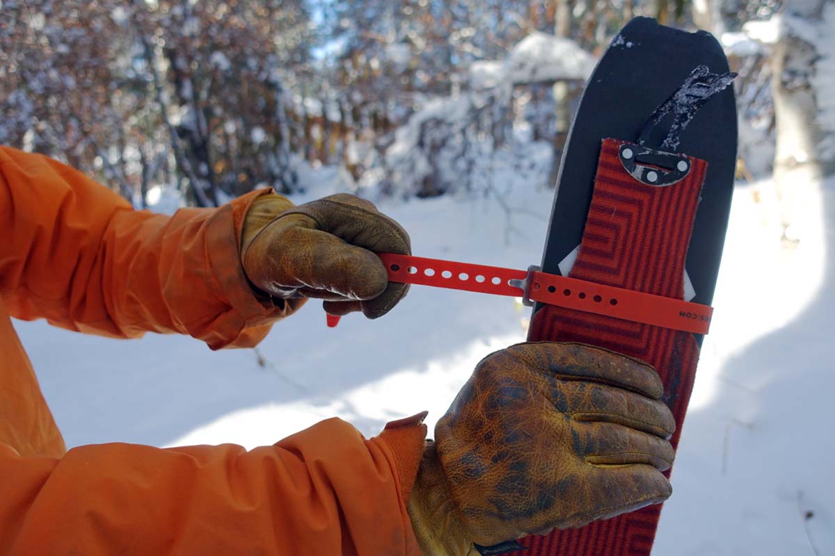 Using a ski strap to secure a broken skin